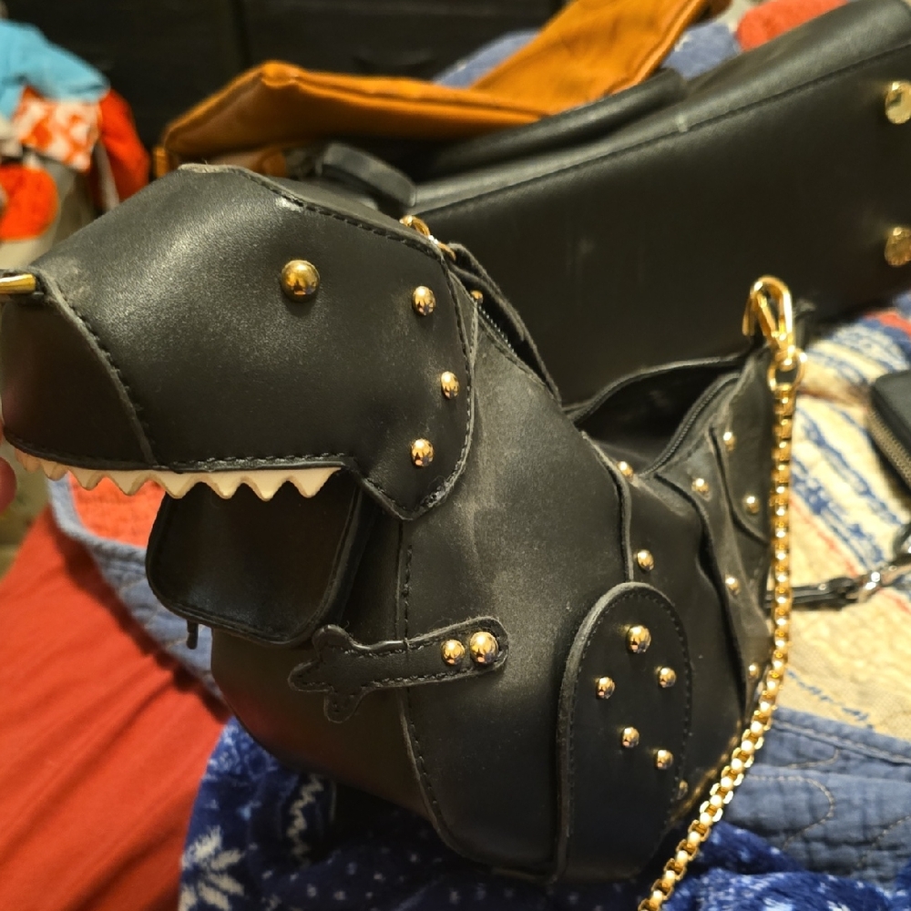 Black Dinosaur-Shaped Bag with Gold Accents